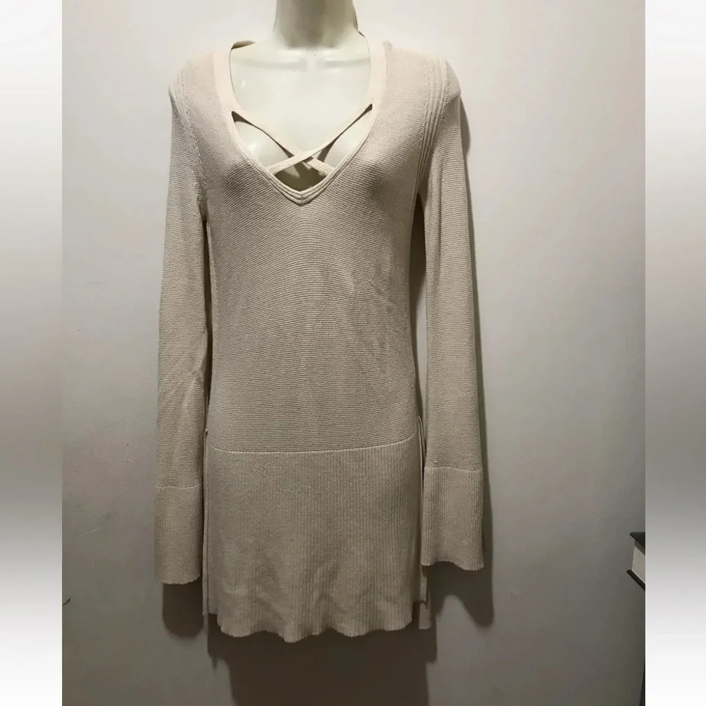 Free People cream color bell sleeve sweater with deep V-neck side slits linen b…
